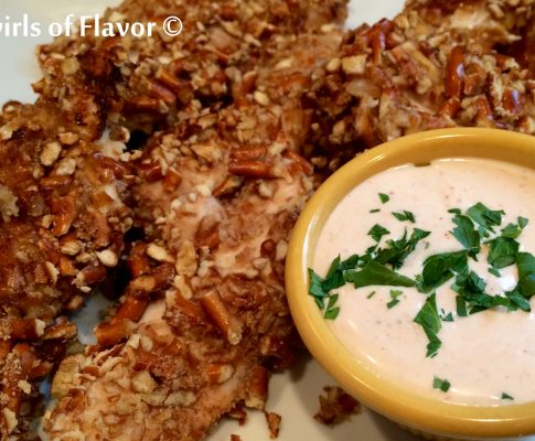 Pretzel Ranch Chicken Tenders is an easy recipe with a crunchy pretzel coating and spicy dipping sauce making them a perfect appetizer for movie night or watching the big game. Serve them with a Buffalo Ranch Dipping Sauce and this baked pretzel-crusted chicken tenders recipe will be a favorite in no time!