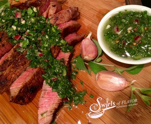 Spice-Rubbed Sirloin With Chimichurri Sauce is a flavorful and easy recipe for dinner tonight! Seasoned steak topped with a homemade chimichurri sauce is bursting with fresh vibrant flavors that will dance on your palate! It's garlicky, herby, spicy and tangy all at the same time! #steak #beef #sirloin #skirtsteak #flanksteak #dinner #easyrecipe #homemadechimichurrisauce #chimichurrisauce #herbsauce #whole30 #swirlsofflavor